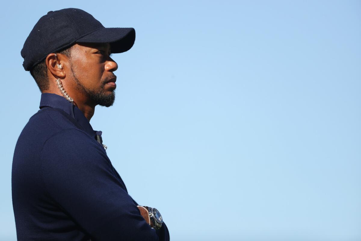 Tiger Woods looks on during the Ryder Cup at Hazeltine National Golf Club in Chaska, Minn., on Oct. 1.
