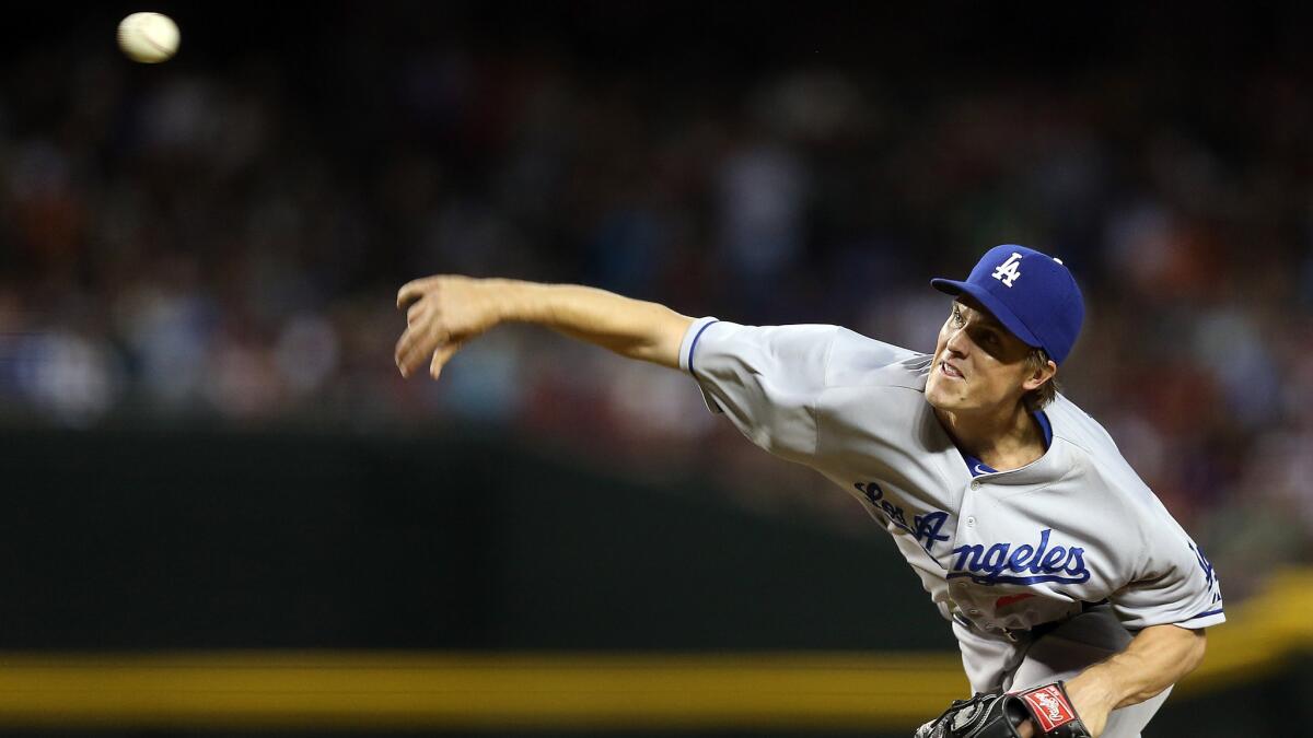 Dodgers starter Zack Greinke delivers a pitch during the team's 7-0 win over the Arizona Diamondbacks on Friday.