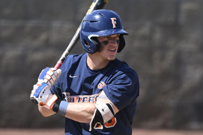 Cal State Fullerton's Cole Urman plays during an NCAA baseball game against UC Irvine on Saturday.