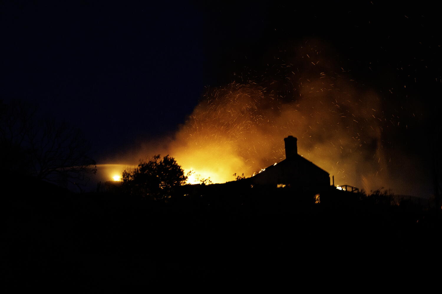 SoCal braces for more Santa Ana winds as fire destroys homes in Orange County