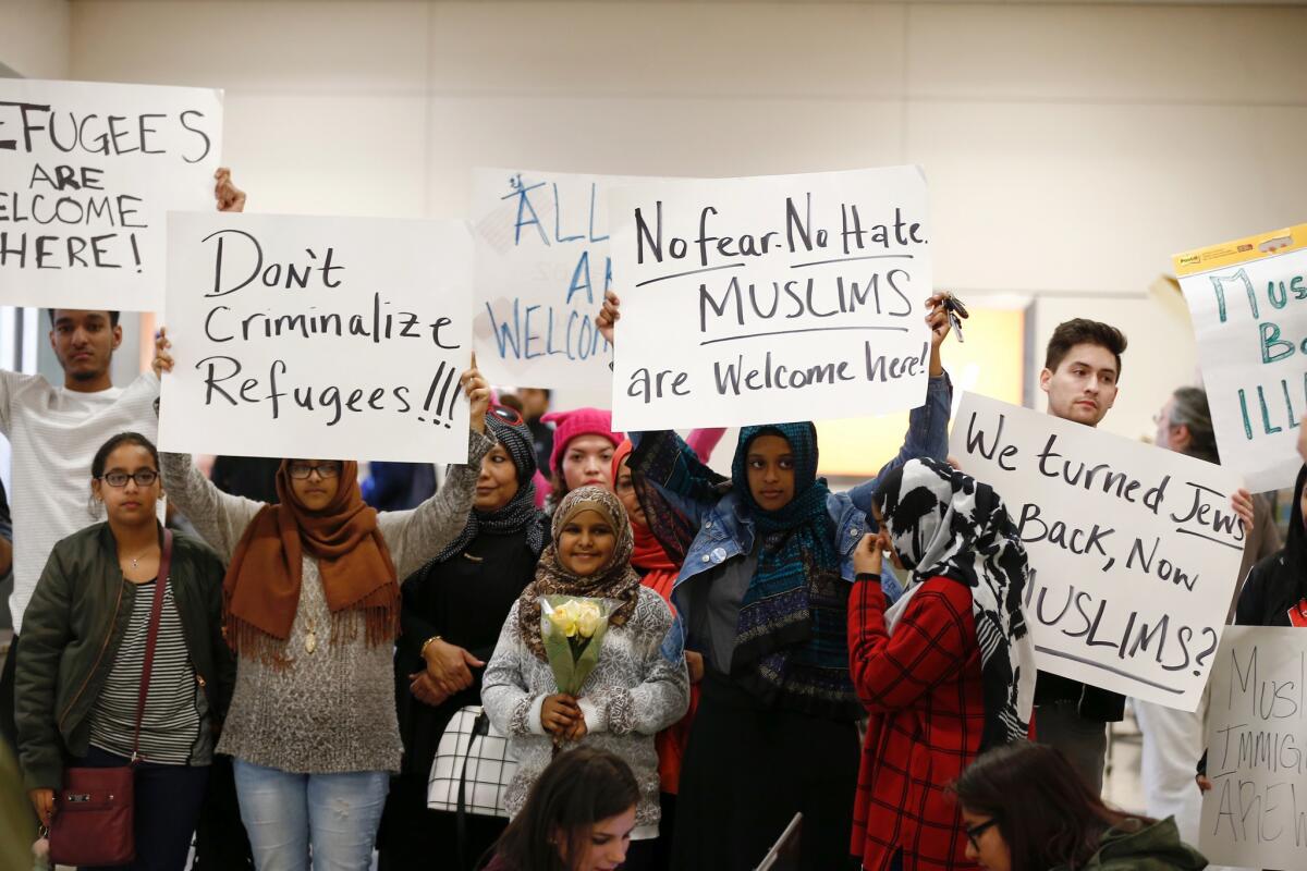 Protesters at Dallas-Forth Worth International Airport demonstrate on Jan. 28 against President Trump's executive order restricting refugees and immigrants from seven Muslim-majority countries.