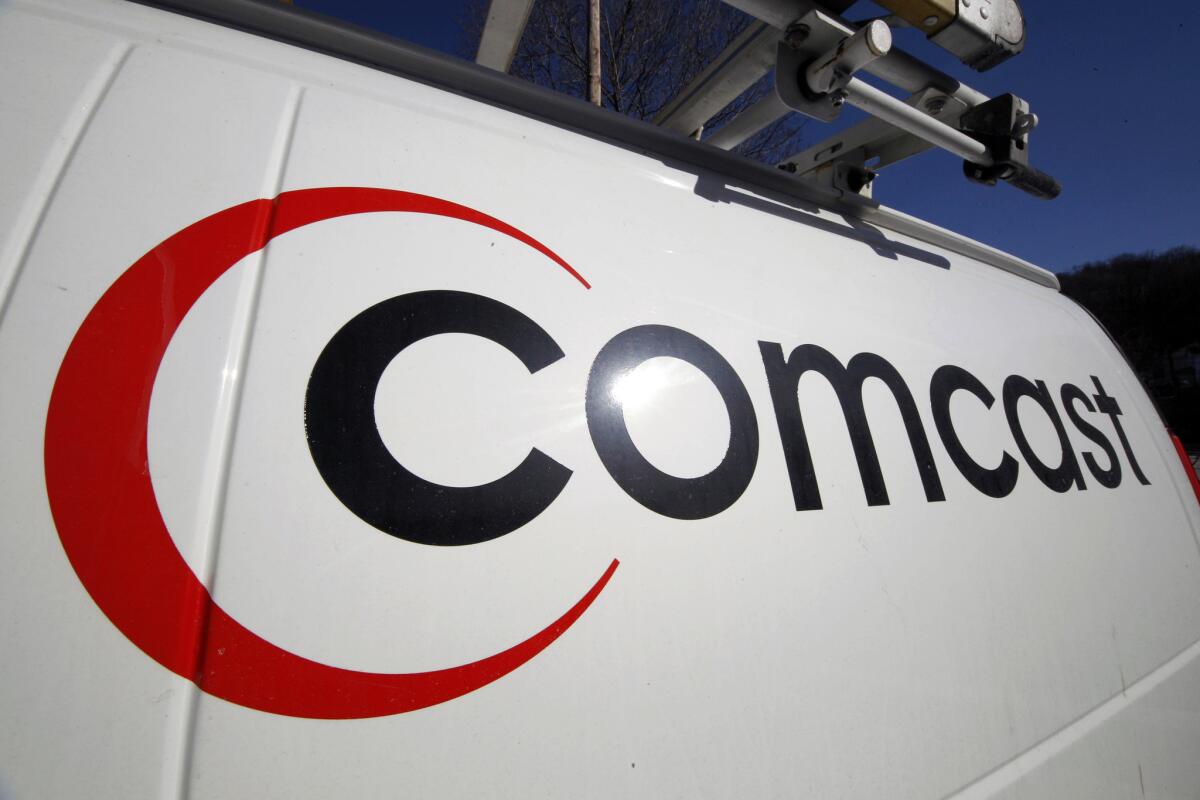 A Comcast logo on one of the company's vehicles in Pittsburgh.