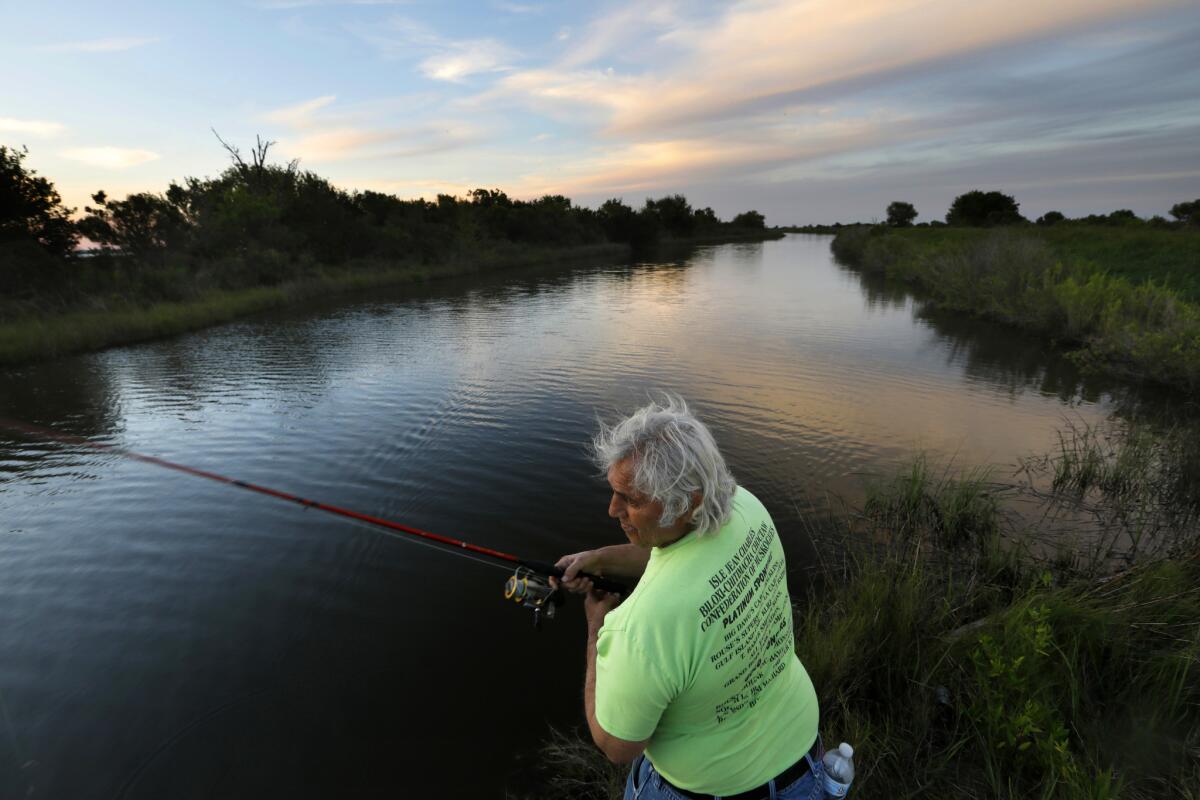 Edison Dardar has spent his whole life on Isle de Jean Charles, La., where he fishes daily: "I don't think the island's going nowhere."