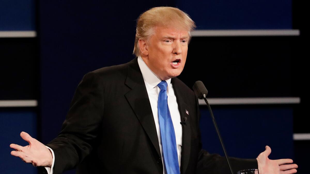 Donald Trump answers a question during the presidential debate with Hillary Clinton at Hofstra University in Hempstead, N.Y., on Sept. 26.