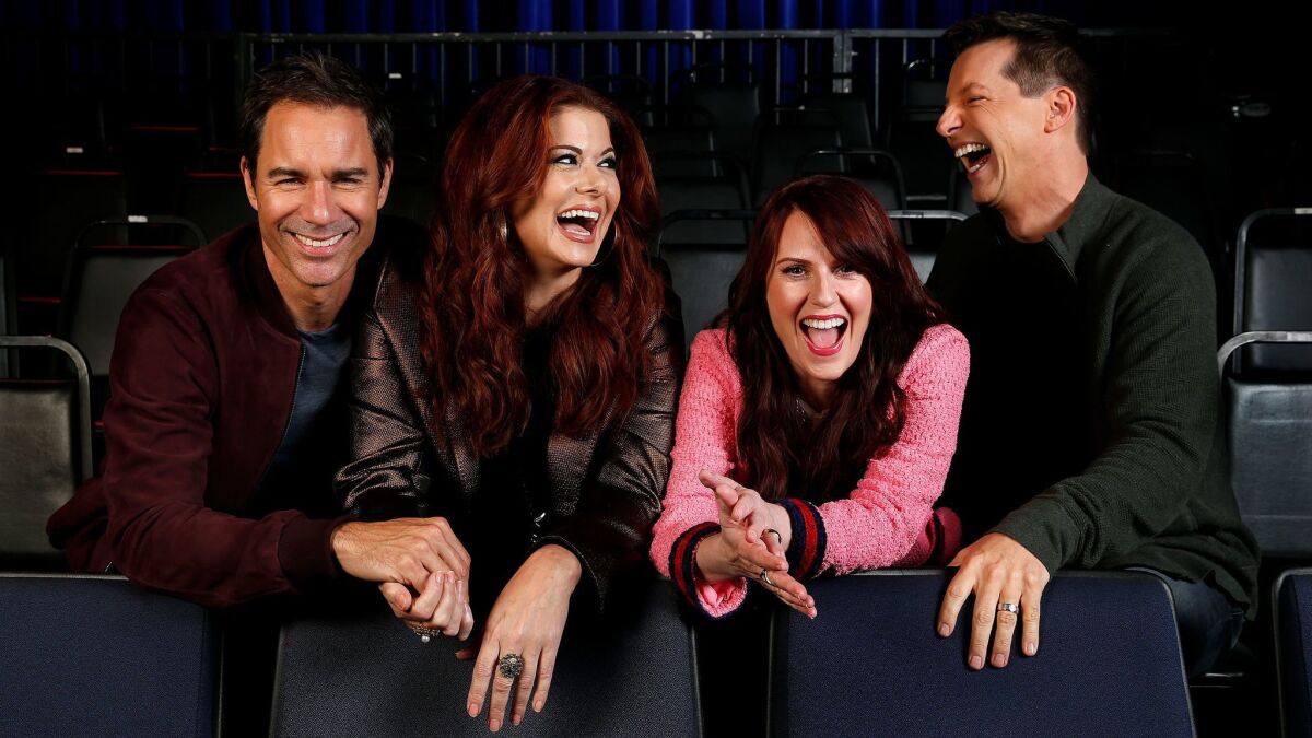 The cast of "Will & Grace" -- Eric McCormack, left, Debra Messing, Megan Mullally, and Sean Hayes -- share a laugh in the audience bleachers on the set of the revival at the NBCUniversal lot.