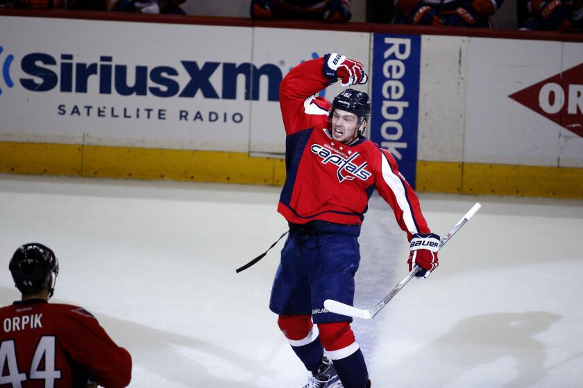 Center Evgeny Kuznetsov celebrates after his game-winning goal during the third period of the Capitals' 2-1 Game 7 win against the Islanders.