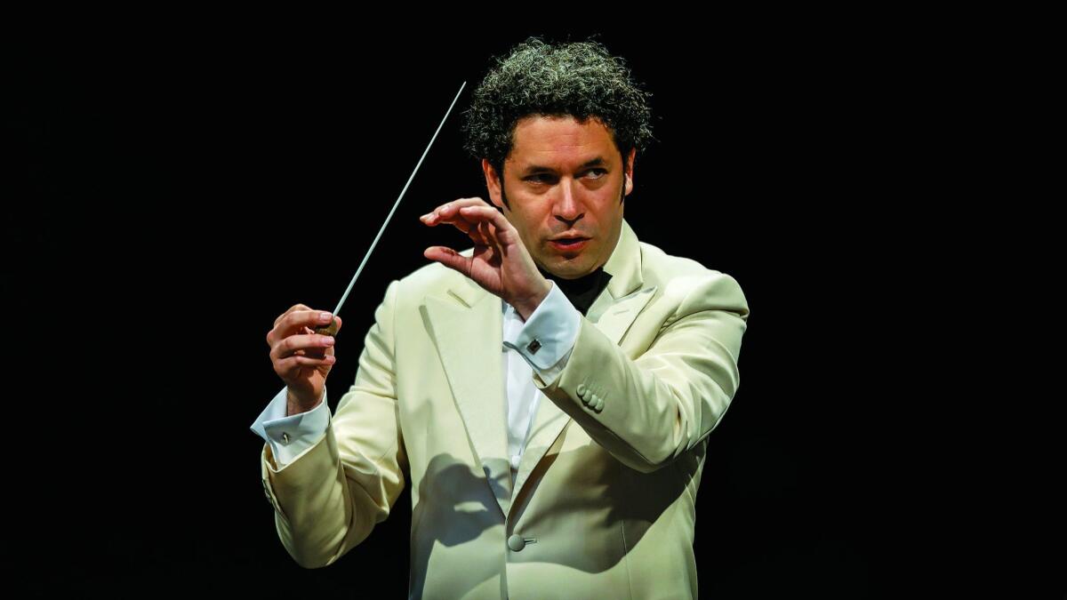 Conductor Gustavo Dudamel leads "The Planets," with the L.A. Philharmonic, at the Hollywood Bowl.