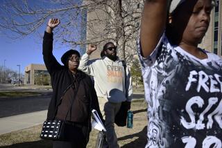 Sheneen McClain, left, the mother of Elijah McClain, and a supporter leave the Adams County Justice Center in Brighton, Colo. on Friday, March 1, 2024. Peter Cichuniec, a Colorado paramedic was sentenced Friday to five years in prison for the death of Elijah McClain in a rare prosecution of medical responders that has left officials rethinking how they treat people in police custody. (Hyoung Chang/The Denver Post via AP)