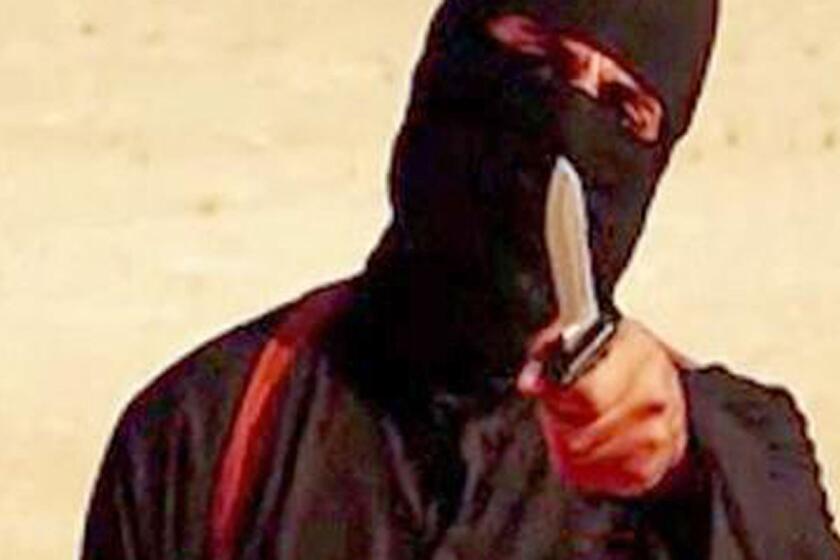 "Jihadi John," the masked Islamic State militant apparently responsible for the beheadings of several Western hostages, is seen in an image grab from a Sept. 2, 2014, video.