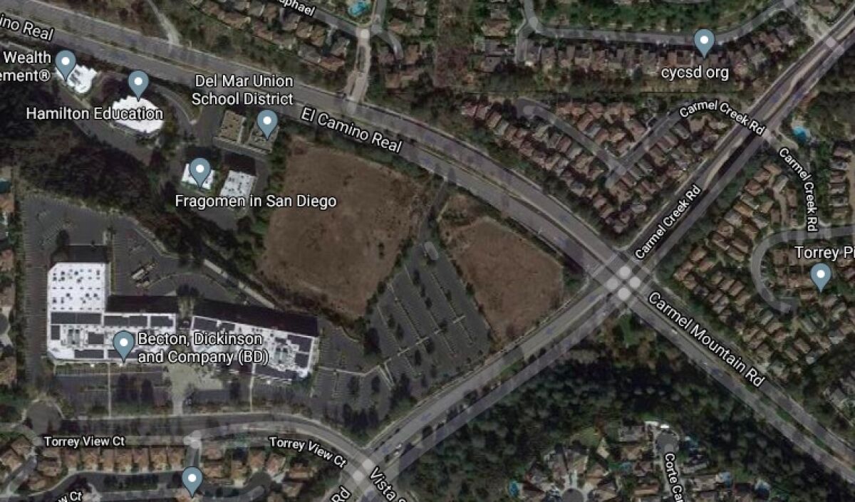 The vacant lot at the corner of Carmel Mountain Road and El Camino Real is planned for a new office complex.