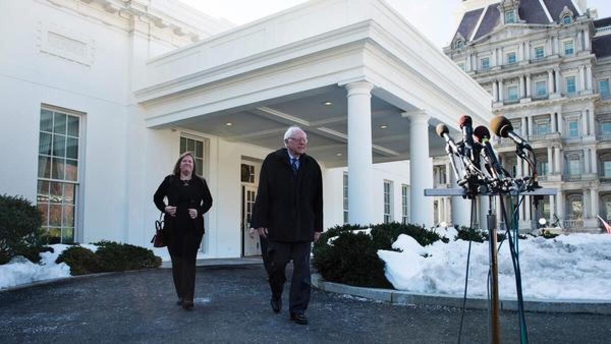 Bernie Sanders and his wife outside President Obama at the White House on Wednesday.