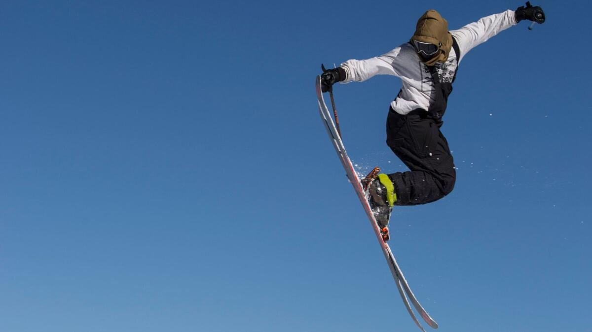 A skier gets a lot of air off of a jump at the Unbound Main Park at Mammoth Mountain in Mammoth Lakes, Calif.