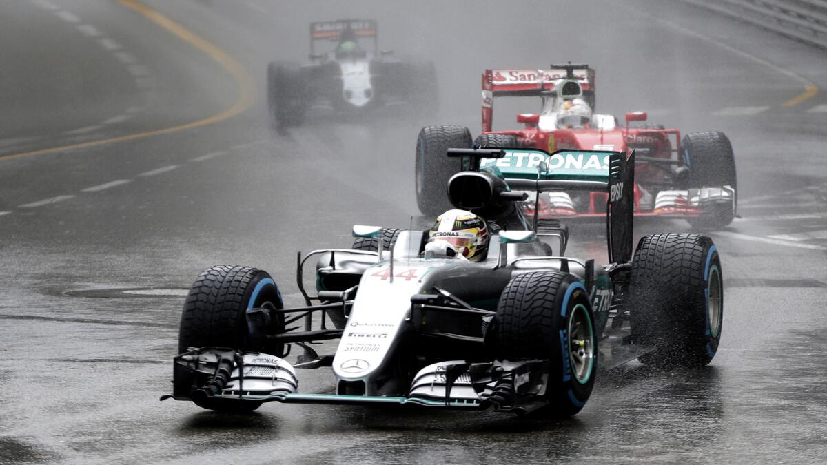 Formula One driver Lewis Hamilton leads the field into a turn during the Monaco Grand Prix on Sunday.