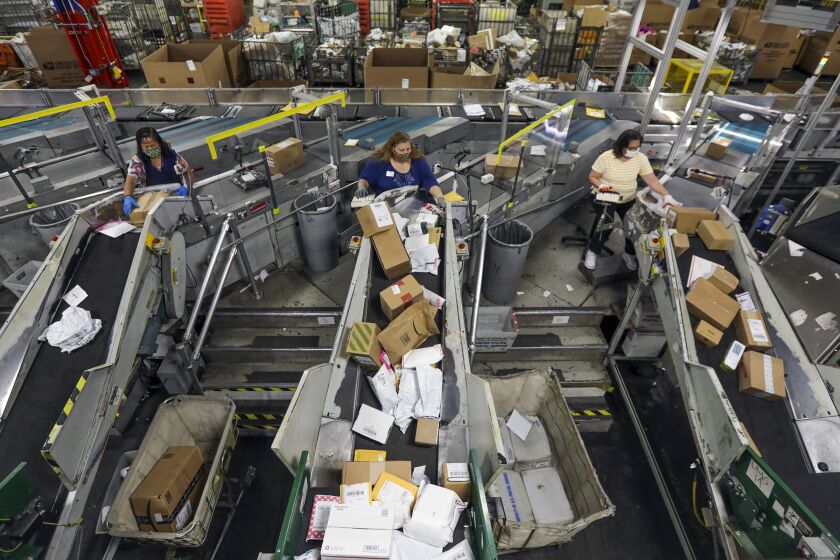 CITY OF INDUSTRY, CA - MAY 14: A view of Automated Parcel and Bundle Sorter at USPS Processing & Distribution Center on Thursday, May 14, 2020 in City of Industry, CA. (Irfan Khan / Los Angeles Times)