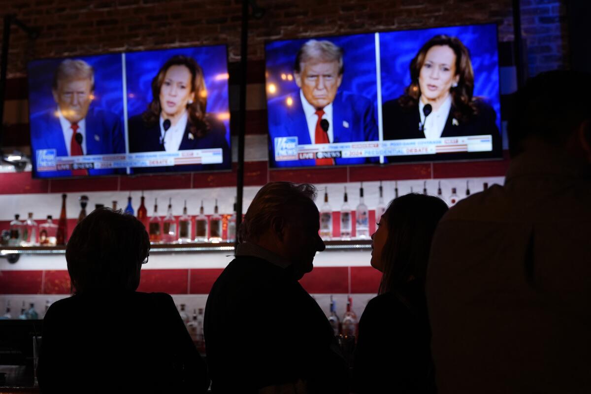 Viewers gather to watch a debate between Vice President Kamala Harris and former President Trump in San Antonio.