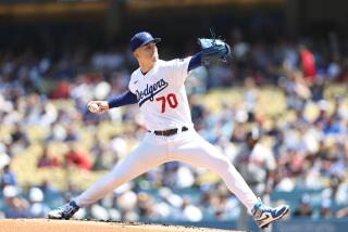 Dodgers pitcher Bobby Miller works against the Atlanta Braves on Sept. 3, 2023, at Dodger Stadium.