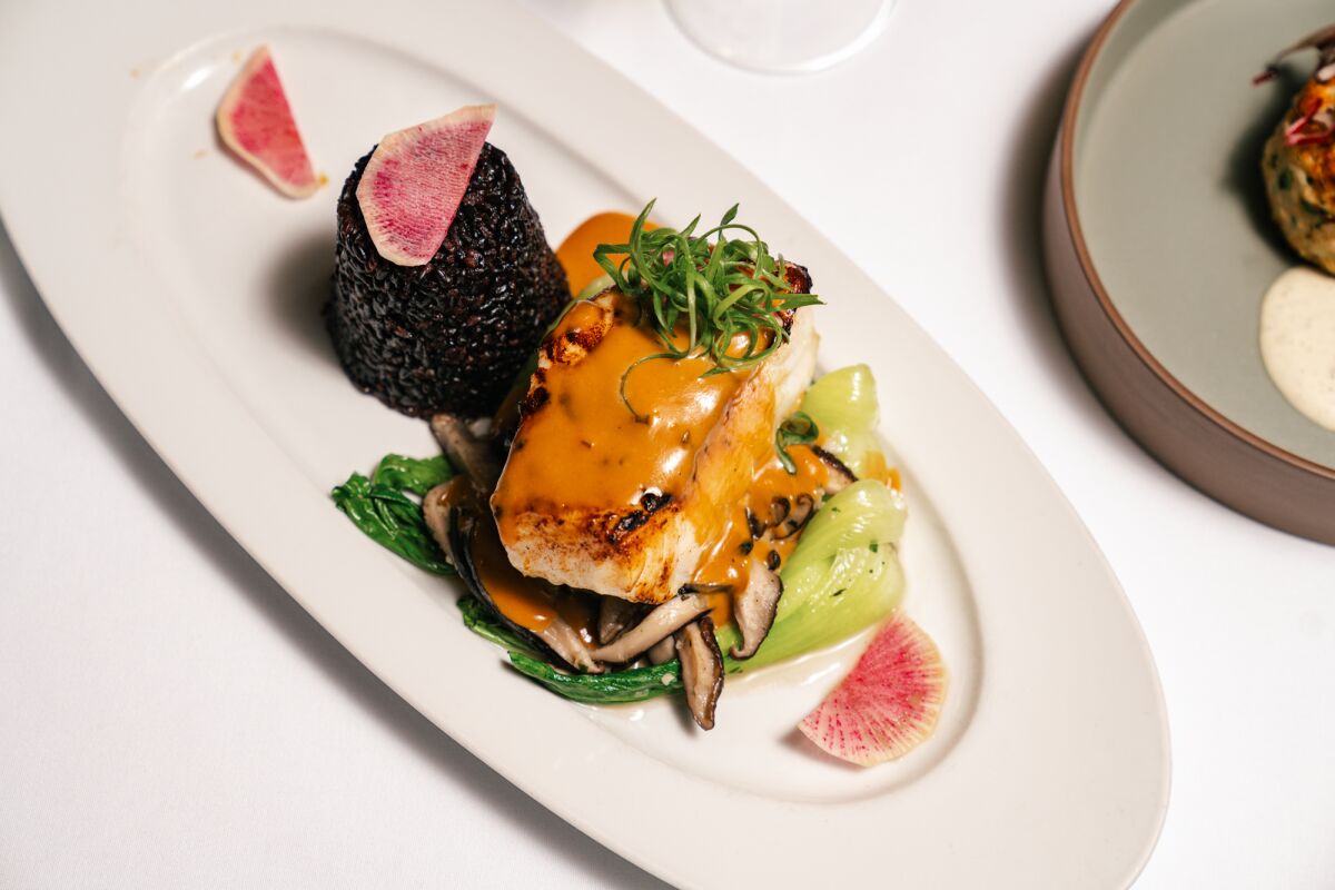 Colorful pan-roasted Chilean sea bass dish
