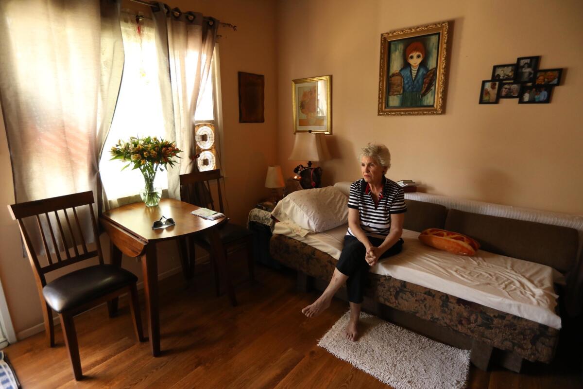 "I'm sad, I'm sad with the loss of neighbors," said Carol Thompson, 75, seated in her apartment on N. Detroit Street in Hollywood on Sept. 26.