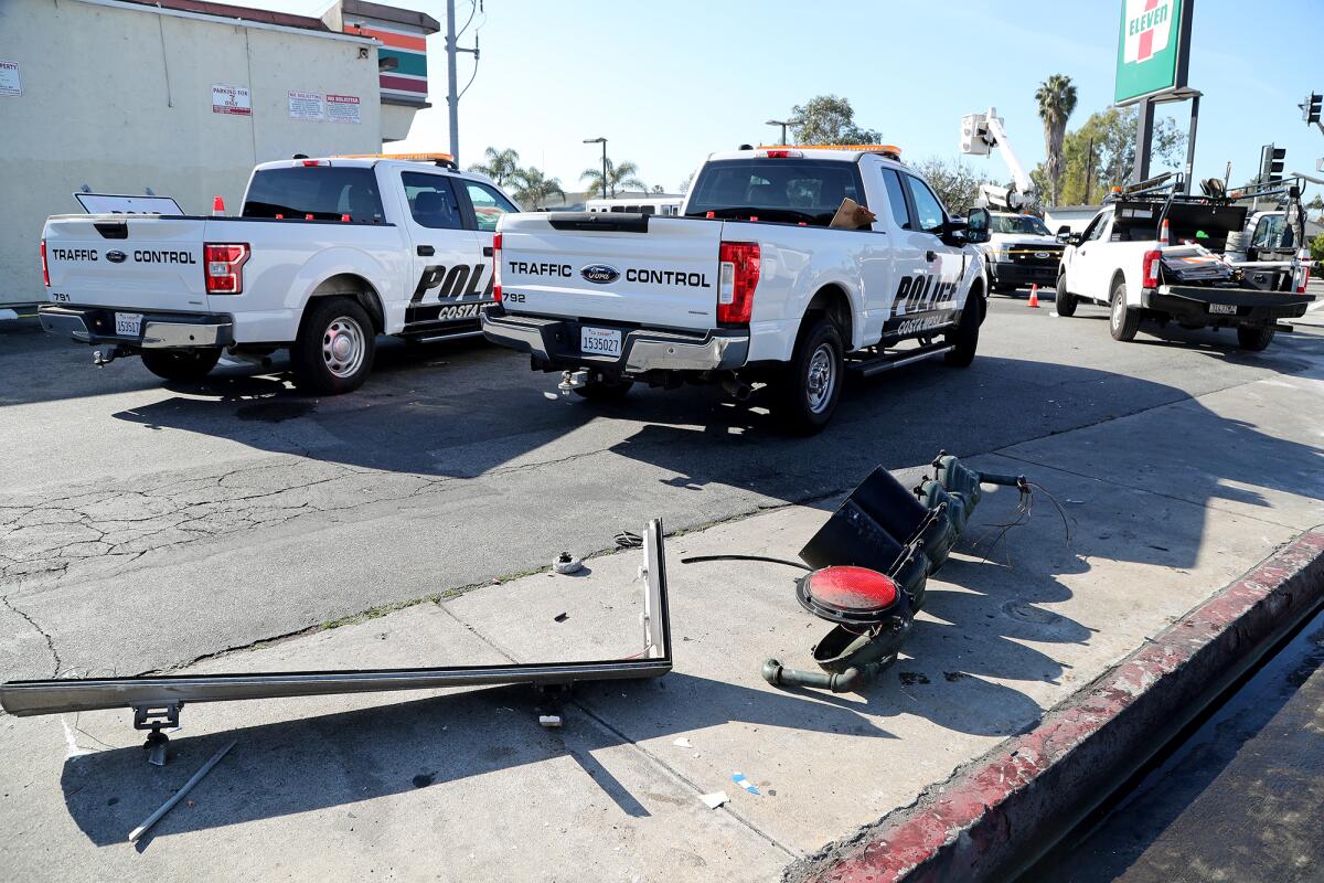 A broken traffic light by 7-Eleven along Victoria Street in Costa Mesa, where a fatal DUI collision took place Tuesday.
