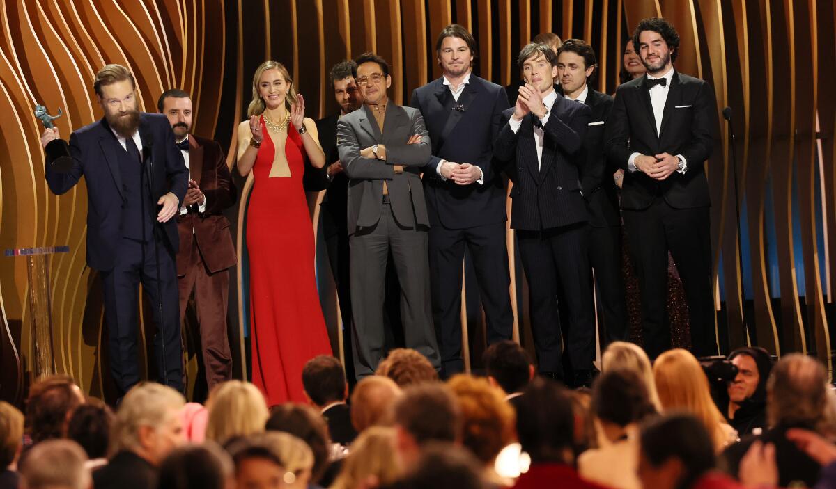The cast of "Oppenheimer" on stage at the 30th Screen Actors Guild Awards after winning the top award Saturday night.