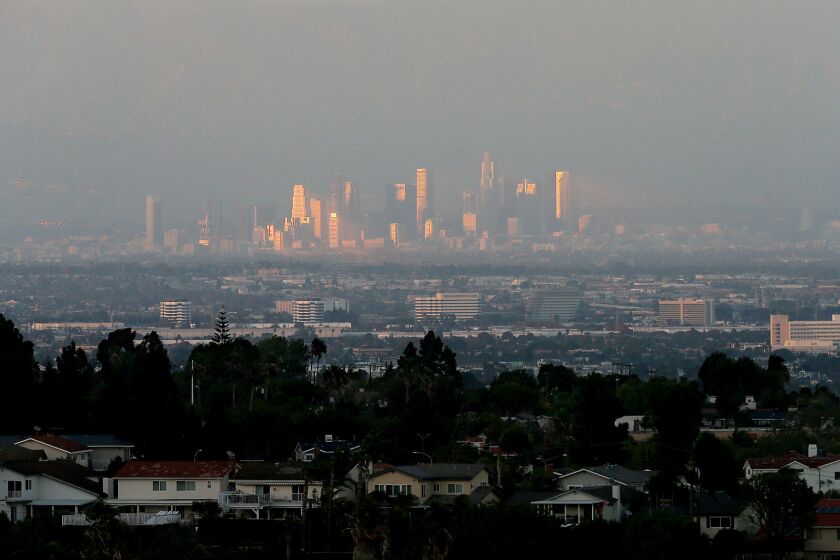 Smog descends on downtown Los Angeles during a November afternoon in 2015.