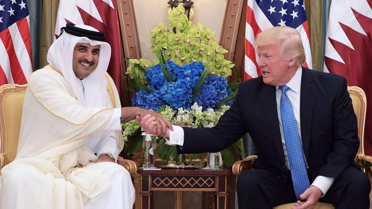 President Trump and Qatar's Emir Sheik Tamim bin Hamad al Thani during a bilateral meeting at a hotel in the Saudi capital, Riyadh, in May 2017. (Mandel Ngan / Agence France-Presse / Getty Images)