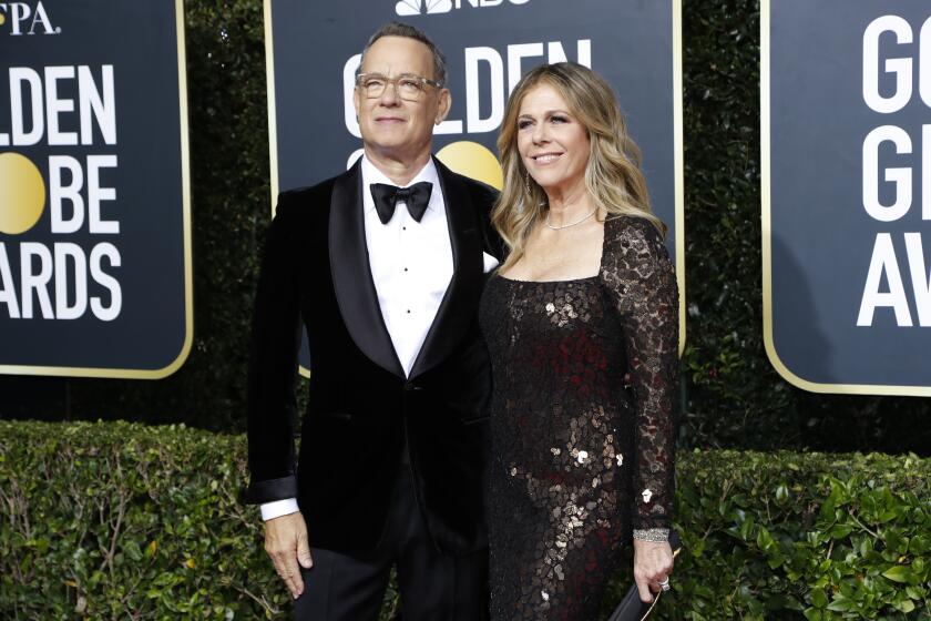 BEVERLY HILLS, CA-JANUARY 05: Tom Hanks and Rita Wilson arriving at the 77th Golden Globe Awards at the Beverly Hilton on January 05, 2020. (Marcus Yam / Los Angeles Times)