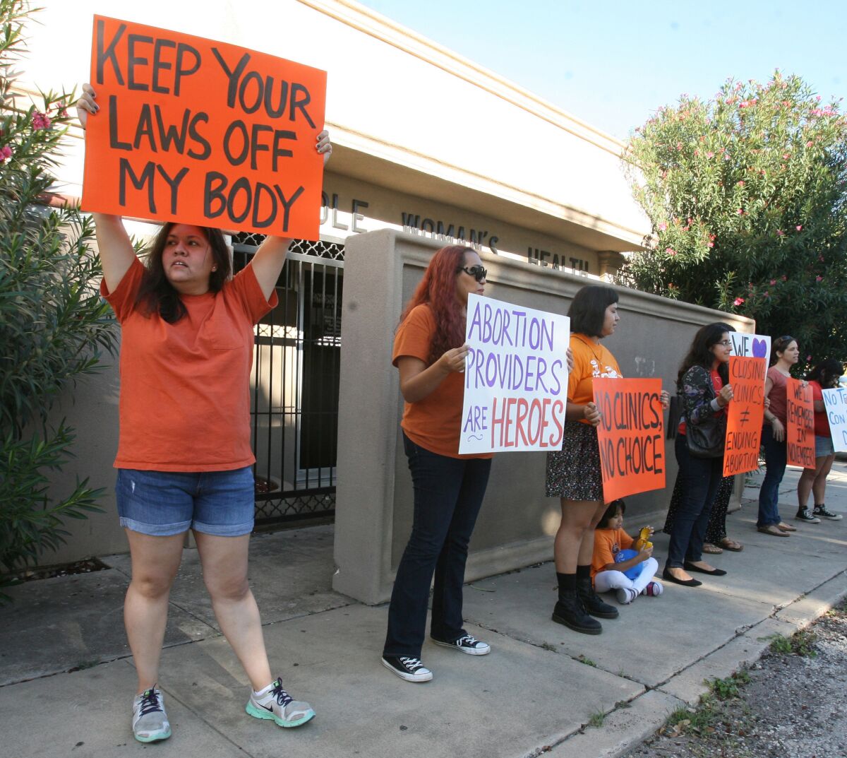 People protest in front of the Whole Women's Health clinic in McAllen, Texas.