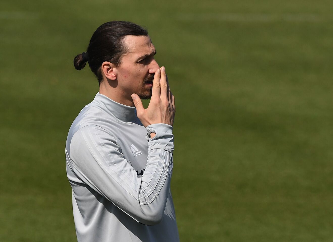 Football star Zlatan Ibrahimovic watches his new teammates during his first training session at his new club LA Galaxy in Los Angeles, California, on March 30, 2018. The 36-year-old Swedish striker's move to MLS from Manchester United was confirmed last week, with Ibrahimovic swiftly vowing to reignite the Galaxy's fortunes after they finished bottom of the league last season. / AFP PHOTO / Mark RALSTONMARK RALSTON/AFP/Getty Images ** OUTS - ELSENT, FPG, CM - OUTS * NM, PH, VA if sourced by CT, LA or MoD **