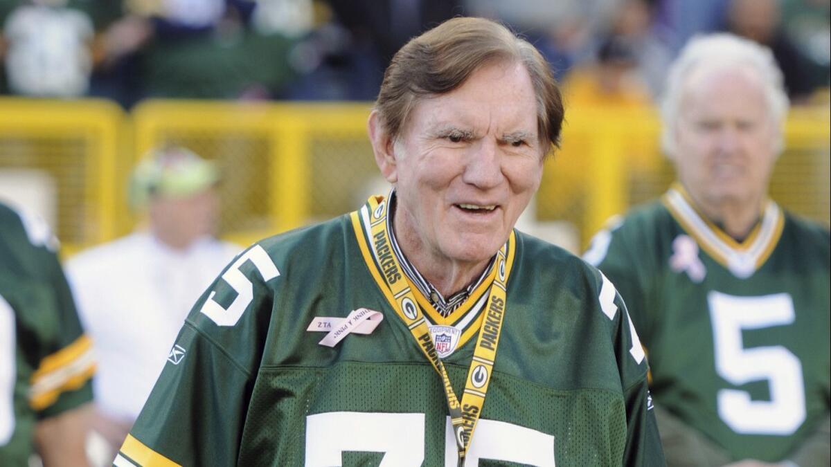Former Green Bay Packers player and Hall of Famer Forrest Gregg is recognized during a halftime ceremony at a Packers game against the Denver Broncos in 2011.