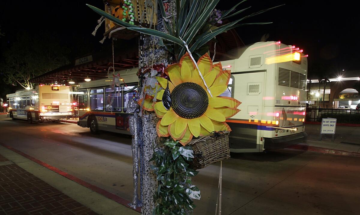 A light post serves as a memorial to Kelly Thomas, a mentally ill homeless man who was beaten to death by Fullerton police last year near Harbor Boulevard. In Anaheim, demonstrators amassed on Harbor over the summer following police shooting deaths, underscoring the long if under-appreciated history of civic activism on the boulevard.