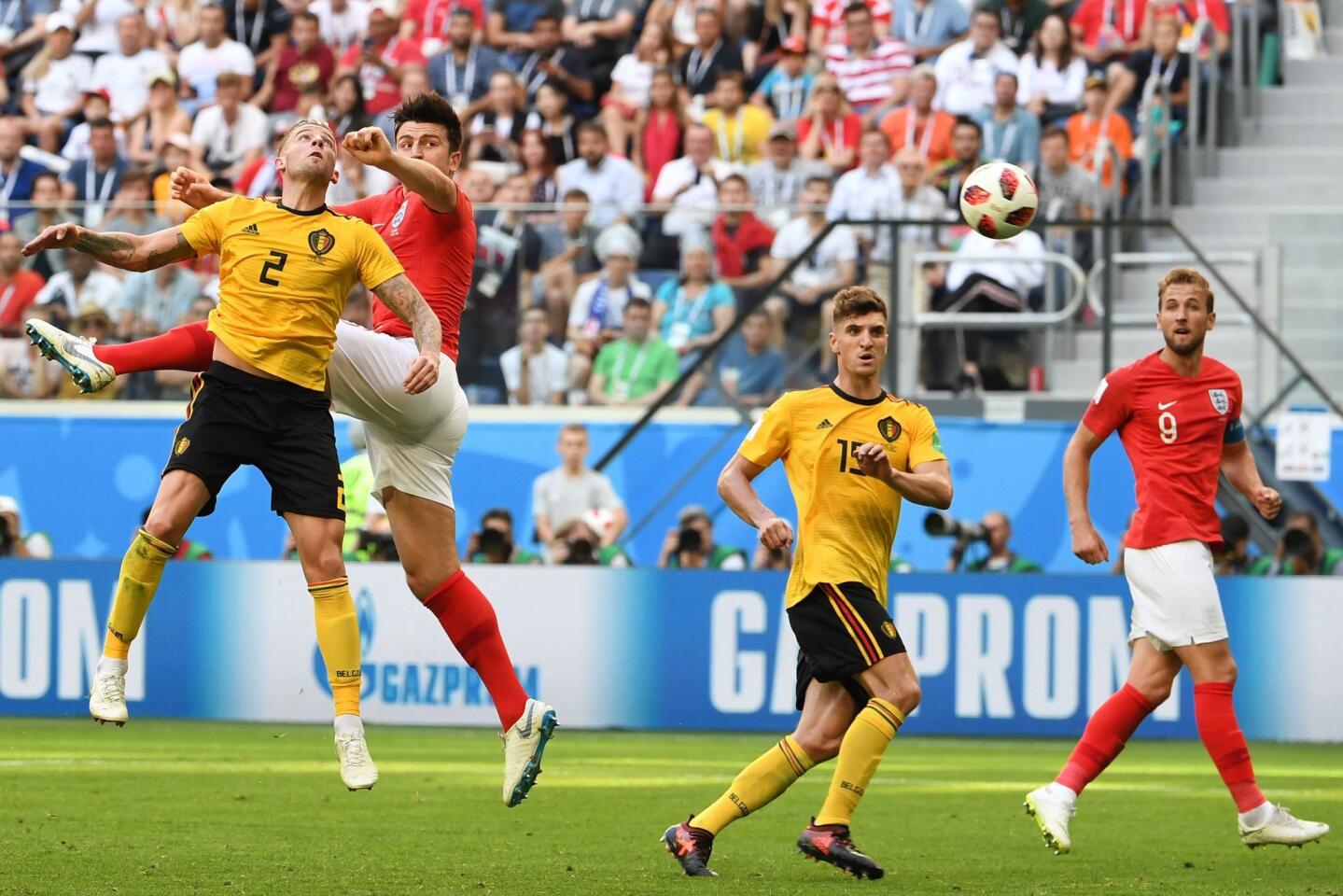 Belgium's defender Toby Alderweireld (L) and England's defender Harry Maguire (2nd L) jump for the ball during their Russia 2018 World Cup play-off for third place football match between Belgium and England at the Saint Petersburg Stadium in Saint Petersburg on July 14, 2018. / AFP PHOTO / Paul ELLIS / RESTRICTED TO EDITORIAL USE - NO MOBILE PUSH ALERTS/DOWNLOADS PAUL ELLIS/AFP/Getty Images ** OUTS - ELSENT, FPG, CM - OUTS * NM, PH, VA if sourced by CT, LA or MoD **