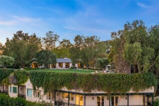 The three-acre spread includes a ranch-style home designed by Cliff May, four-bedroom guesthouse, gym, yoga studio, swimming pool and chicken coop.