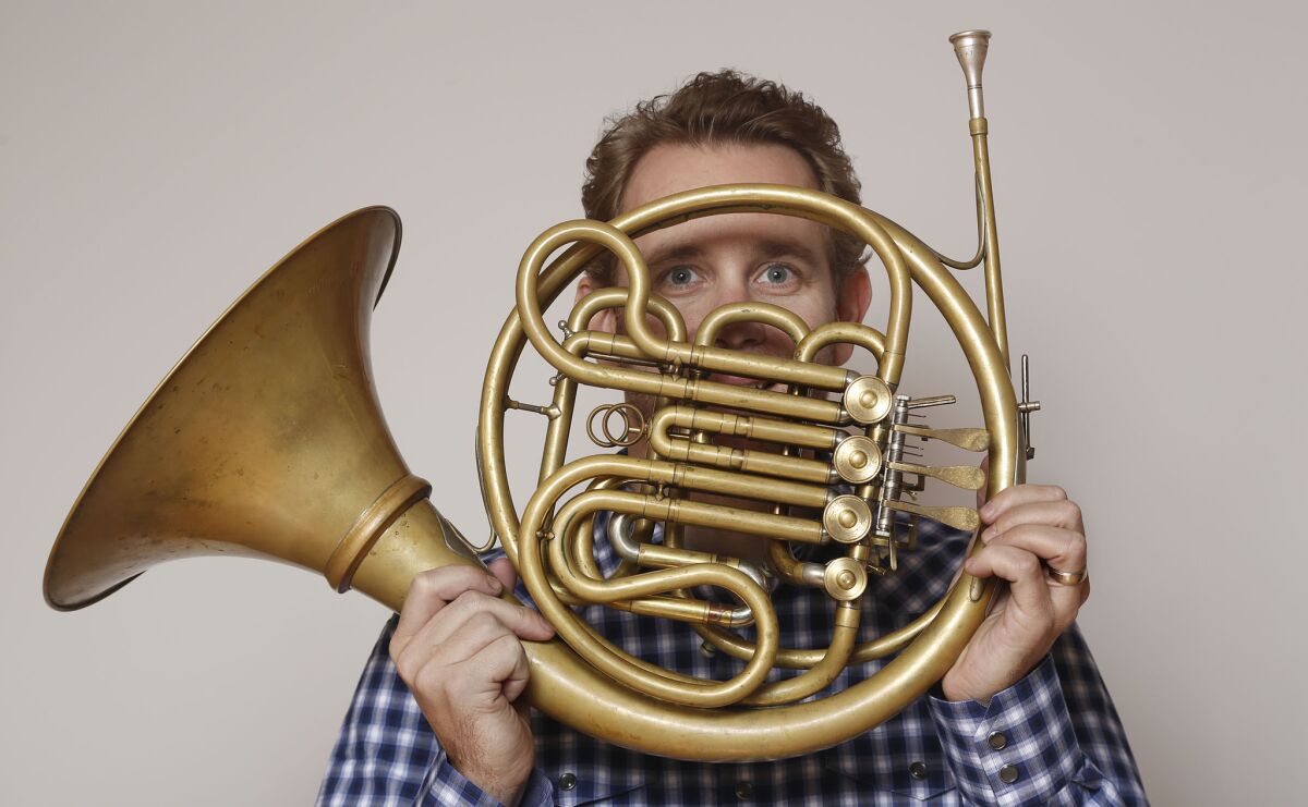 Los Angeles Philharmonic's principal horn Andrew Bain, featured soloist in "Brilliant Brass," says he feels "very lucky every day."