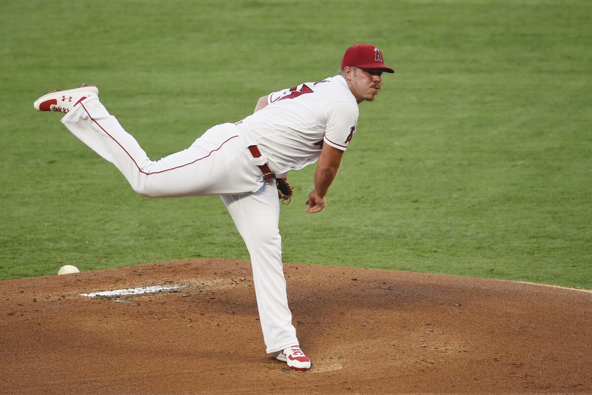 Angels pitcher Dylan Bundy delivers a pitch against the Oakland Athletics at Angel Stadium.