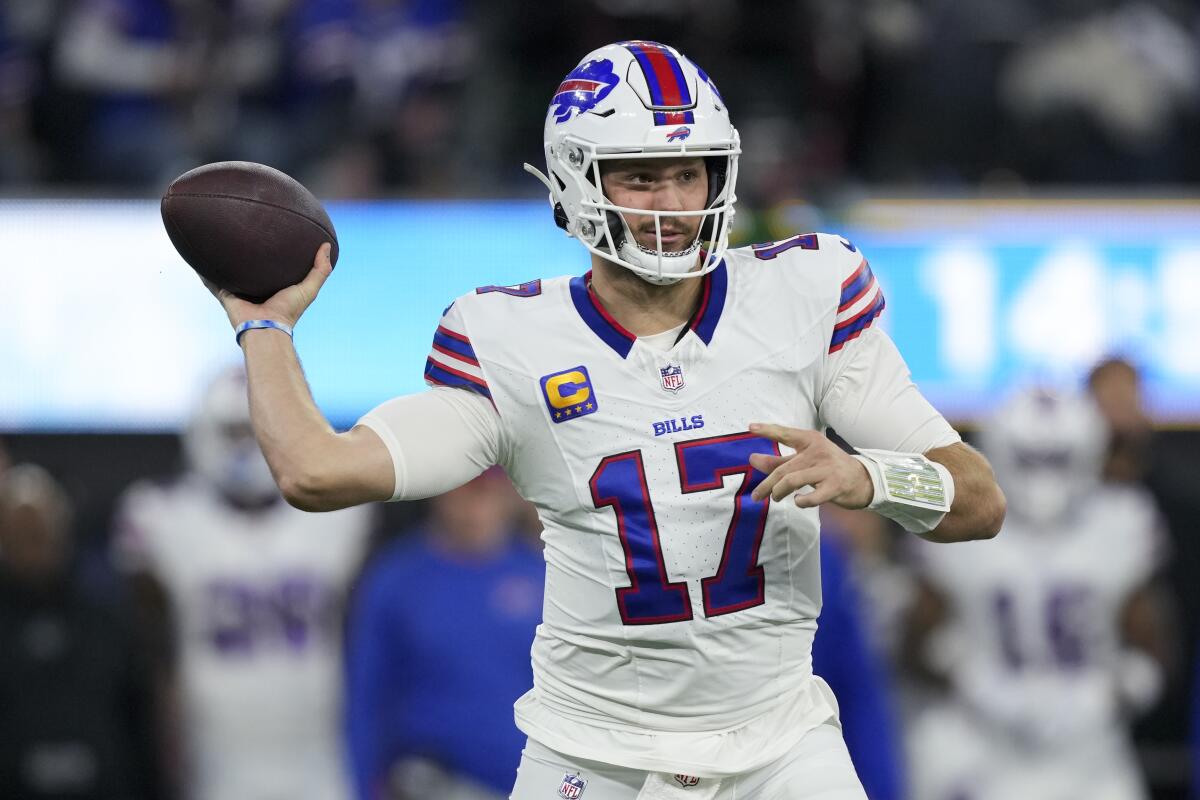 Buffalo Bills quarterback Josh Allen passes during the first half against the Chargers.