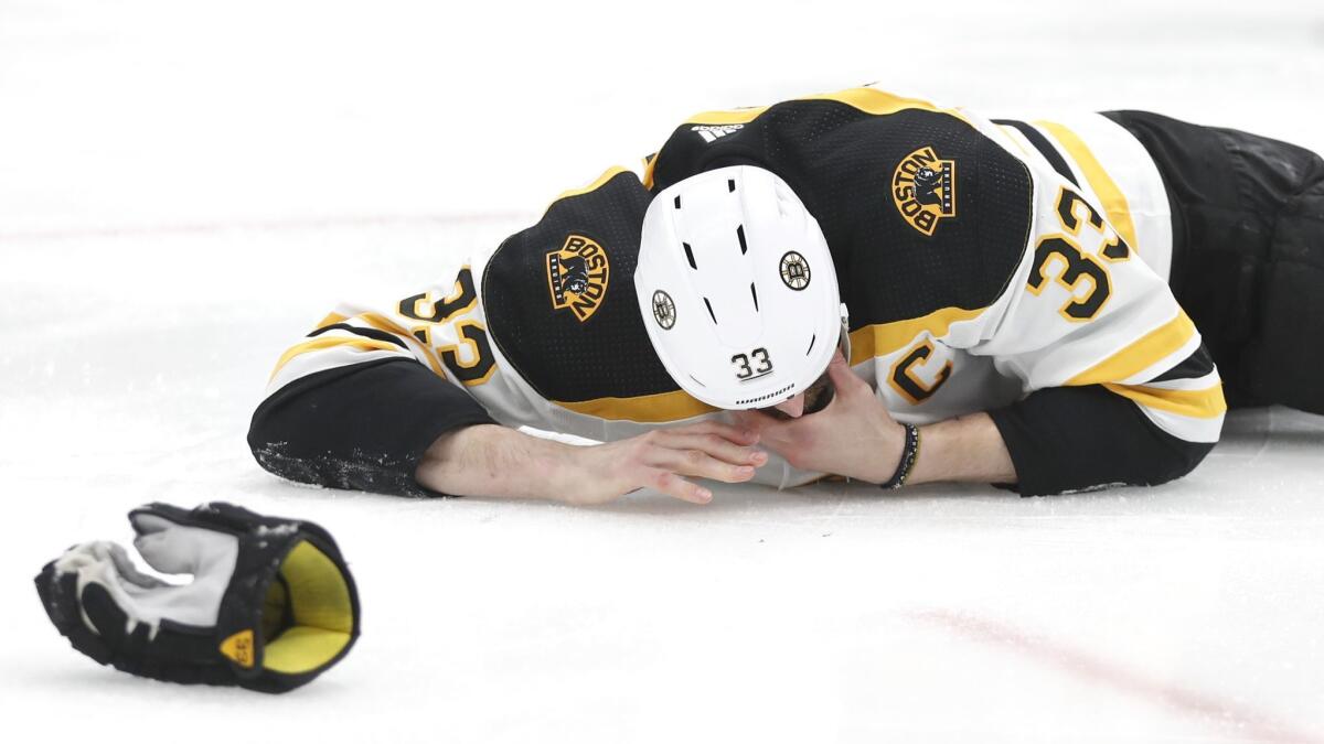 Boston defenseman Zdeno Chara was hit in the face with the puck during Game 4 of the Stanley Cup Final against the St. Louis Blues on June 3.