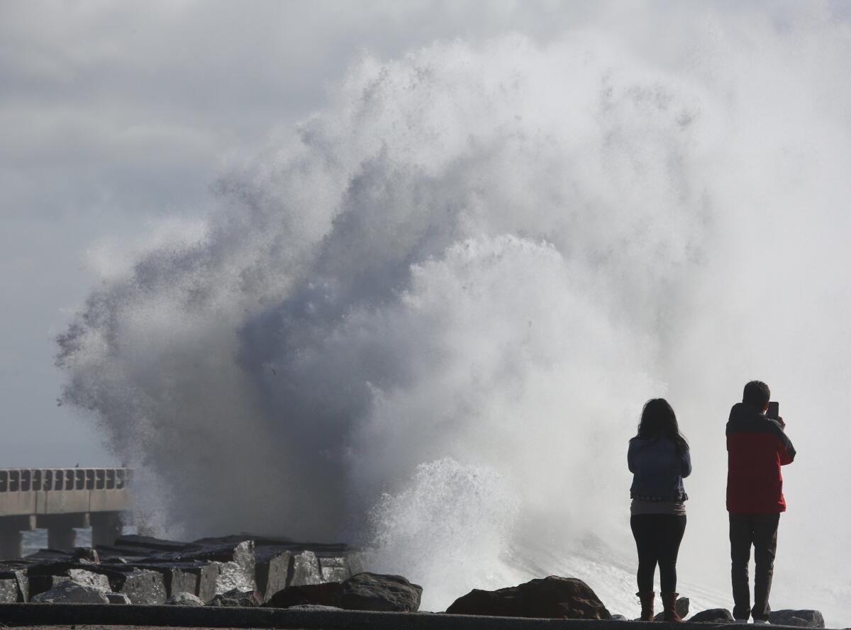 High surf with waves like those that lashed Cabrillo Beach in San Pedro on Jan. 7 will pound Central and Southern California this week, forecasters said.