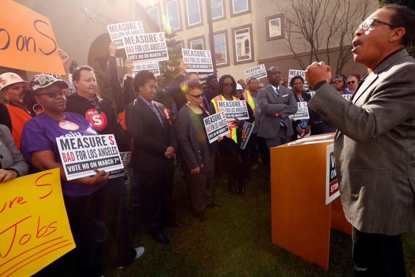 Residents and elected officials at an event urging voters to reject Measure S, which could freeze investment in South L.A.