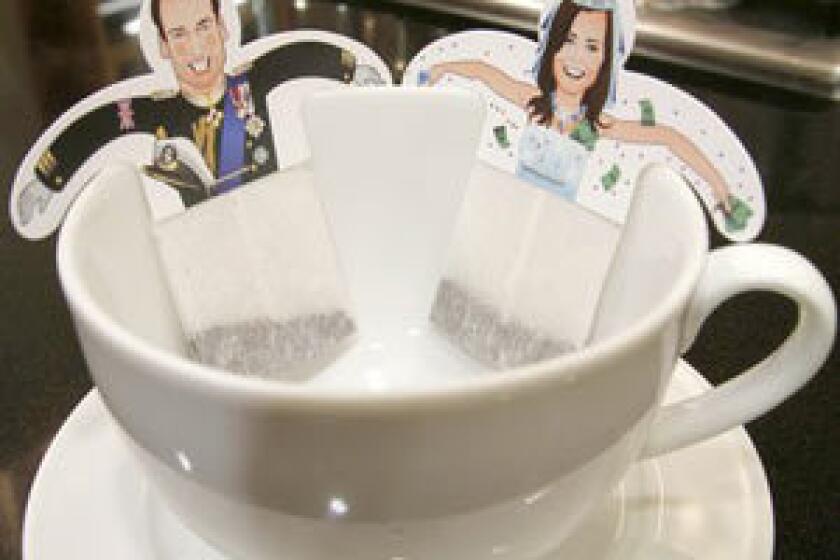 The KaTEA & William greeting card comes with tea bags topped with cutouts of the royal couple.