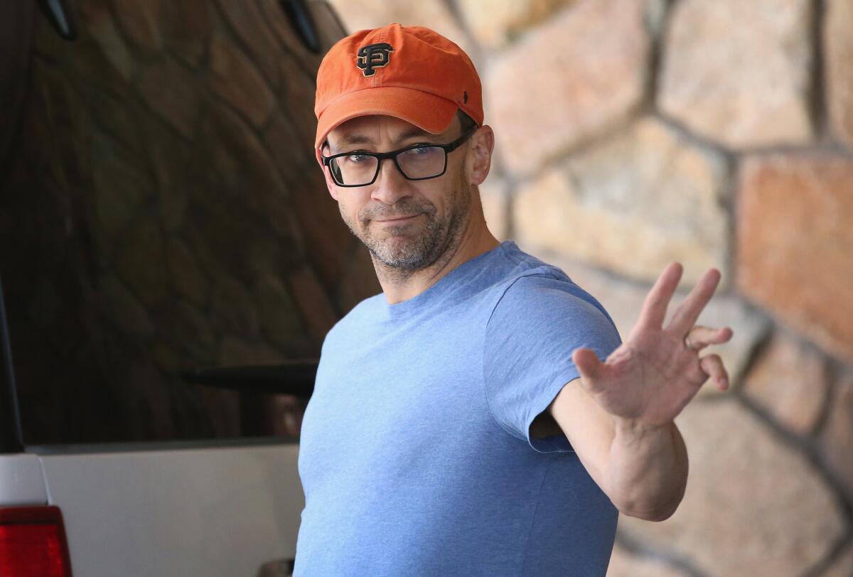 Twitter CEO Dick Costolo is shown. The social media firm recorded revenue of $479 million, up 97% from $242.6 million in the fourth quarter of 2013. However, Twitter's number of worldwide monthly active users rose to 288 million, up only 2% from the previous quarter.