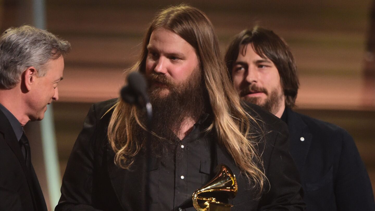 Chris Stapleton receives the Grammy country album for "Traveller" onstage.