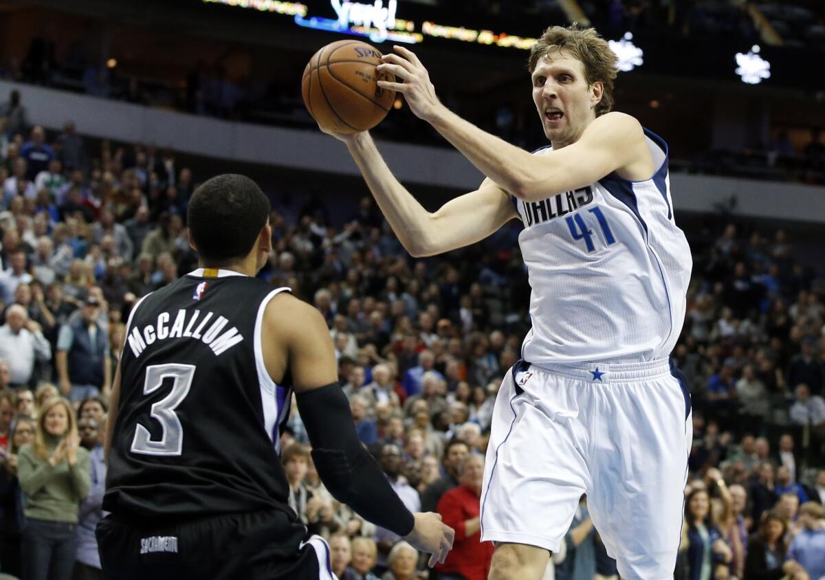 Dallas' Dirk Nowitzki had 23 points and seven rebounds in the Mavericks' come-back victory over the Sacramento Kings, 106-98.