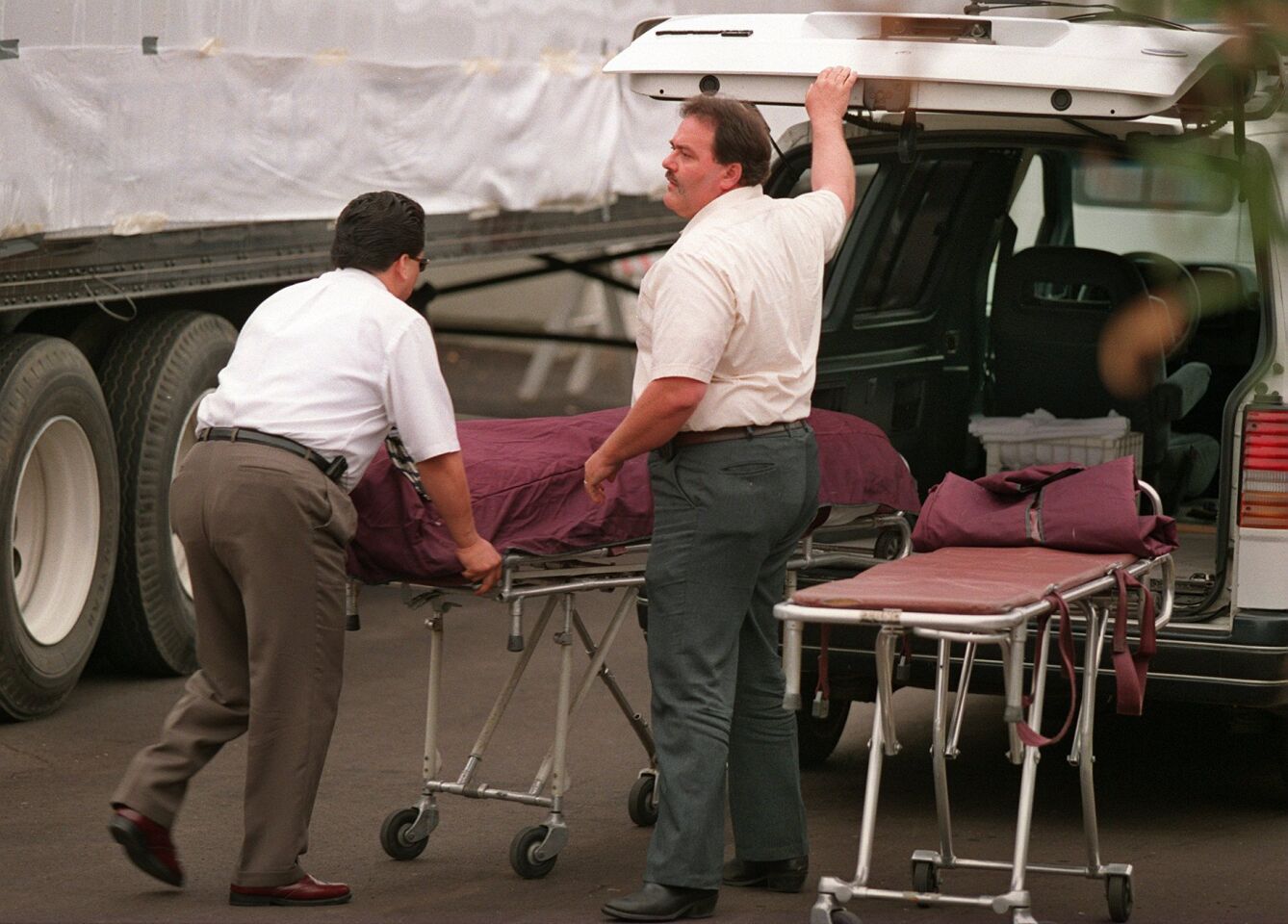 Employees from ADA Mortuary Service loaded into a vehicle one of the bodies from the Heaven's Gate mass suicide in Rancho Santa Fe. The bodies of 39 people were found there on March 26, 1997.