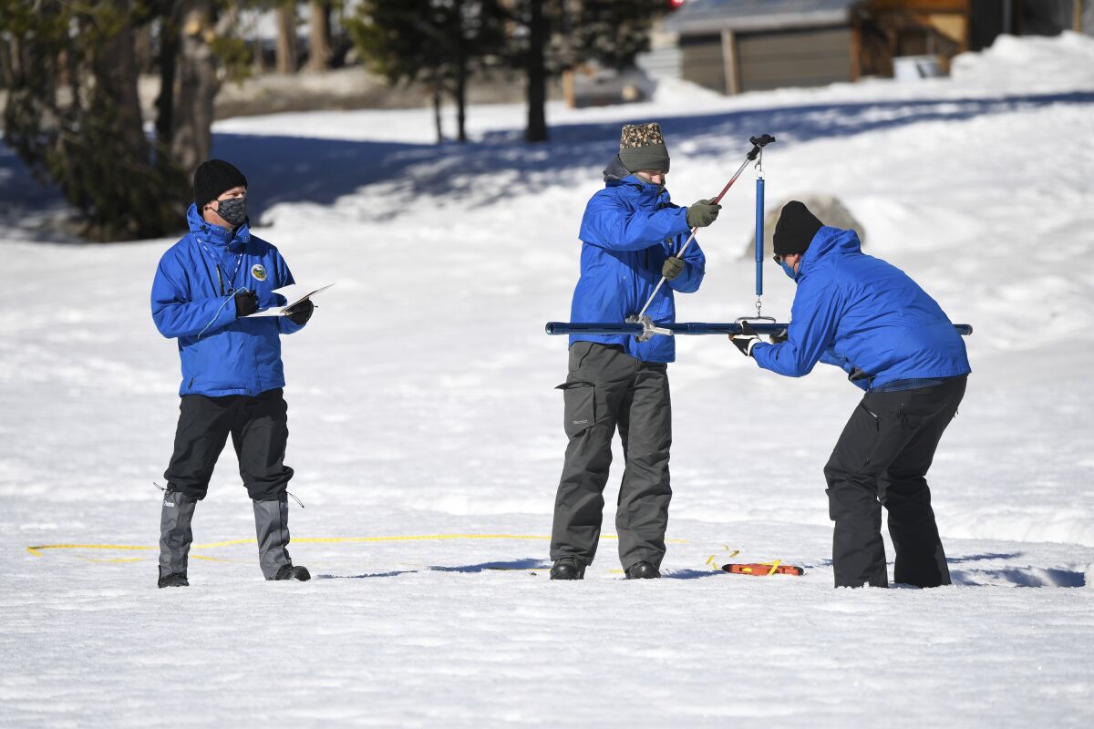California Department of Water Resources conducted the second snow survey of the season held at Phillips Station.