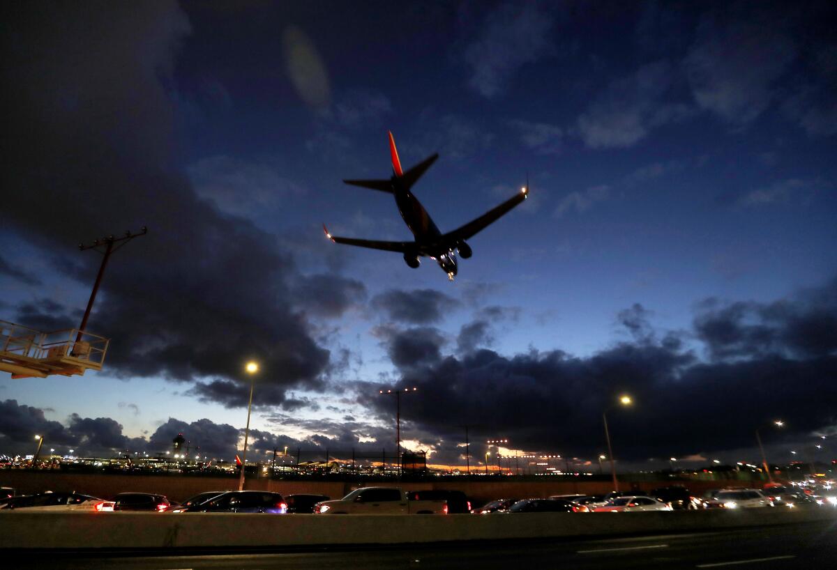 A plane gets ready to land at an airport