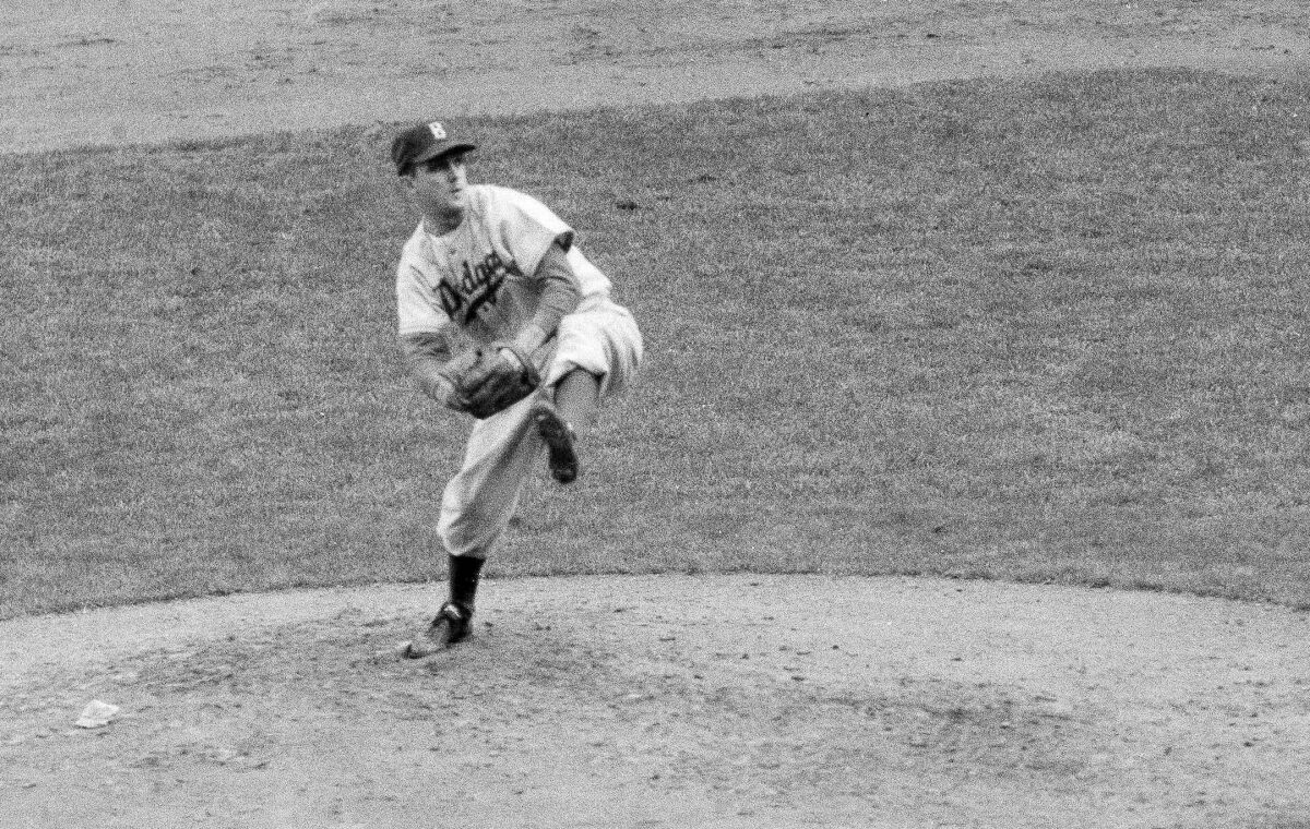 Carl Erskine pitches for the Brooklyn Dodgers against the New York Yankees in Game 5 of the 1952 World Series.