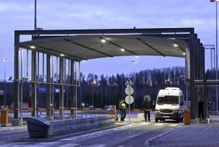 A van at the Nuijamaa, a border station between Russia and Finland in Lappeenranta, Finland, Thursday, Nov. 16, 2023. Finland’s government says it will close four crossing points on its long border with Russia to stop the flow of migrants that it accuses Moscow of ushering to the border in recent months. Finnish officials say they will be closed at midnight Friday on the land border that serves as the European Union’s external border. (Vesa Moilanen/Lehtikuva via AP)