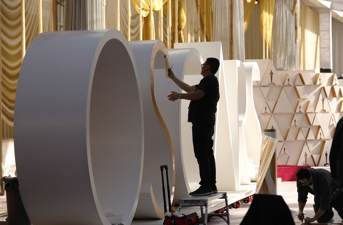 Preparations continue on the red carpet outside the Dolby Theatre for the 92nd Academy Awards. 