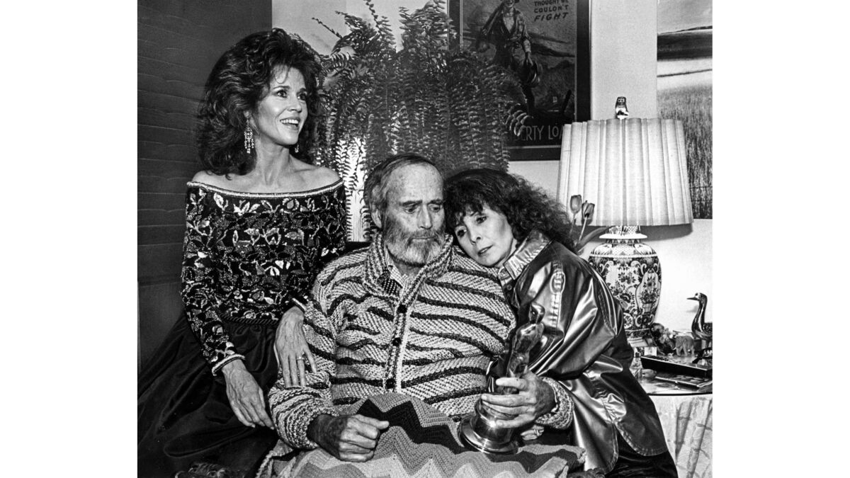 March 29, 1982: Henry Fonda, with wife Shirlee and daughter Jane, gets a good look at his Oscar at his home in Bel-Air.